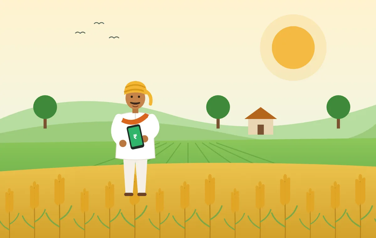 खेत में मोबाइल पर PM Kisan की जानकारी देखता किसान